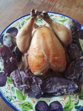 Roast chicken with purple potatoes